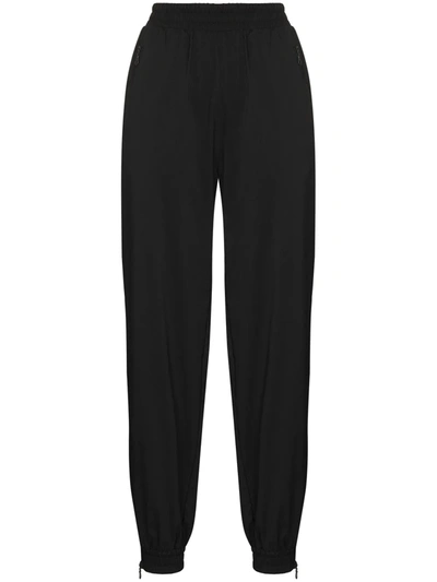Shop Girlfriend Collective Summit Zip-ankle Track Pants In Black