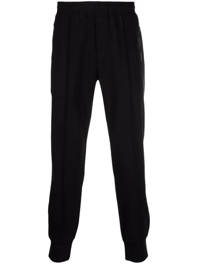 Shop Emporio Armani Solid-colour Slim-fit Track Pants In Schwarz