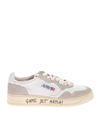 Shop Autry Crackle Effect Sneakers In White