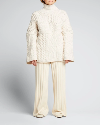 Shop Nanushka Raw Merino Wool Turtleneck Sweater In Light Beige