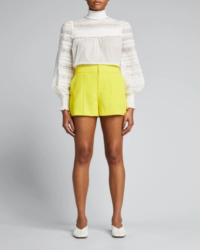 Shop Alice And Olivia Dylan High-waist Pintuck Shorts In Sunbeam