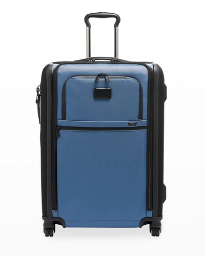 Shop Tumi International Dual Access 4-wheel Carry On In Storm Blue