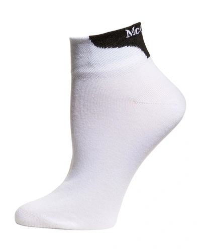 Shop Alexander Mcqueen Logo Branded Ankle Sport Socks In White/black