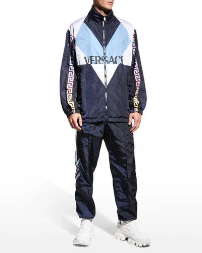 Shop Versace Men's Greca Logo Print Nylon Track Jacket In Navybluemulticolo