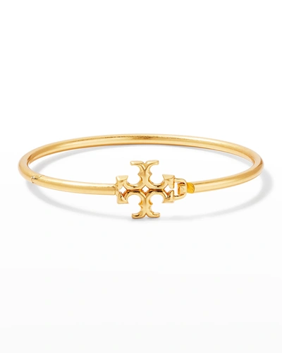 Shop Tory Burch Kira Cuff Bracelet In Rolled Brass