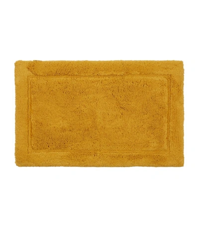 Shop Abyss & Habidecor Must Bath Mat (50cm X 80cm) In Gold