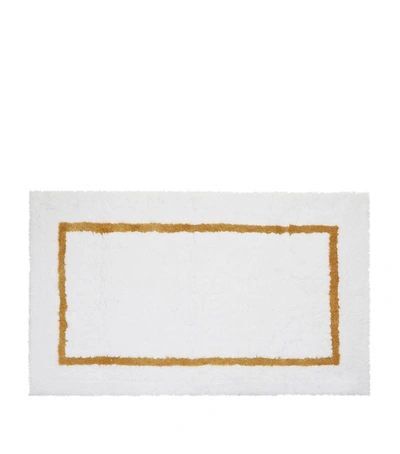 Shop Abyss & Habidecor Karat Bath Mat (70cm X 120cm) In Gold