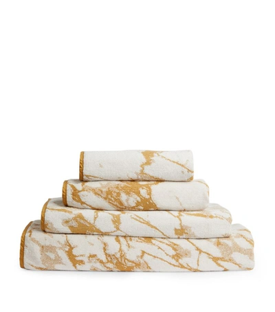 Shop Abyss & Habidecor Marbre Guest Towel (40cm X 75cm) In Gold