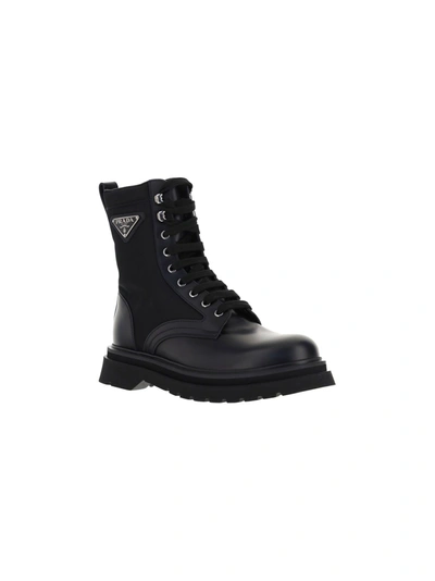 Prada Logo-plaque Panelled Ankle Boots In Black