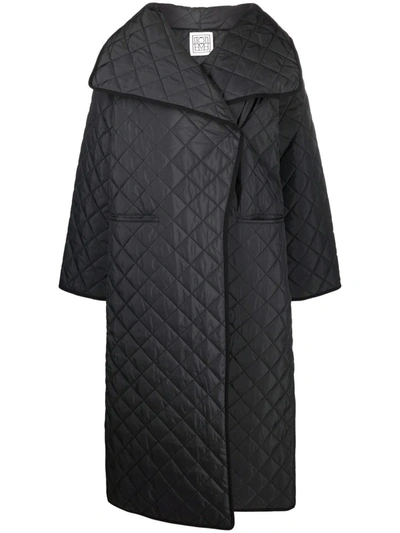 Shop Totême Oversize Quilted Wrap Coat In Black