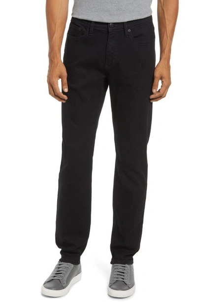 Shop Duer Stay Dry Slim Fit Performance Jeans In Jet Black