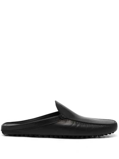 Shop Tod's Sabot Leather Slippers In 黑色