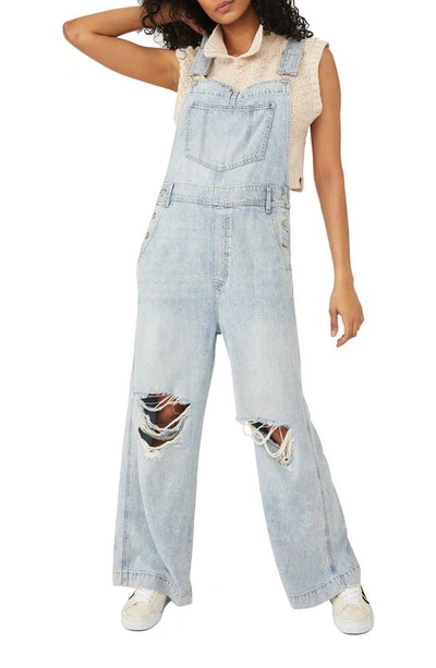 Shop Free People Super Slouchy Ripped Denim Overalls In Time Warp Blue