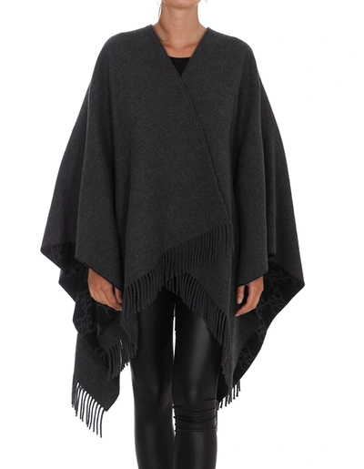 Shop Fendi Logo Detailed Fringed Cape In Black