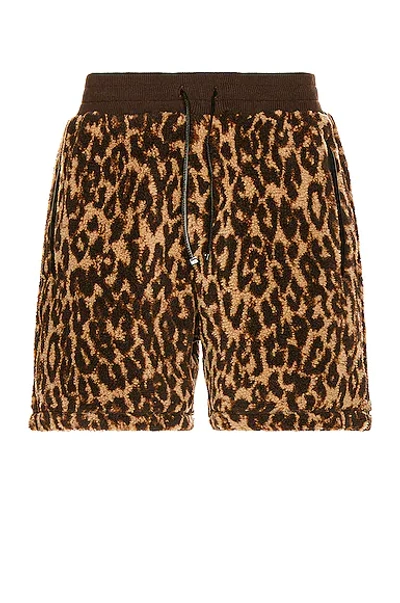 Shop Amiri Printed Leopard Polar Fleece Shorts In Brown & Tan