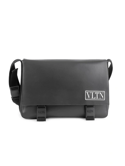 Shop Valentino Vltn Leather Messenger Bag In Black