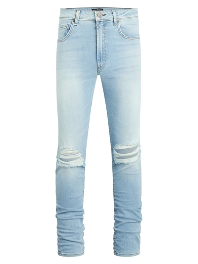 Shop Monfrere Greyson Distressed Skinny Jeans In Distressed Light Blue