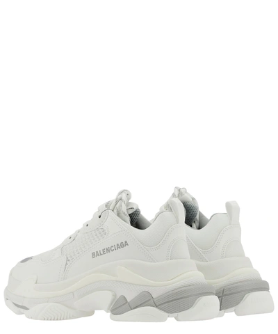 Shop Balenciaga "triple S" Sneakers In White