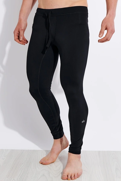 Shop Alo Yoga Warrior Compression Pant In Black