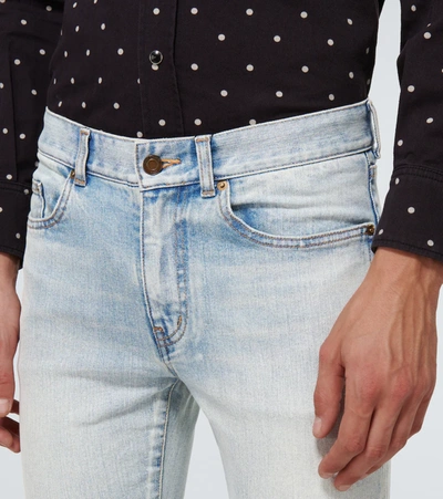 Shop Saint Laurent Skinny-fit Faded Jeans In Blue