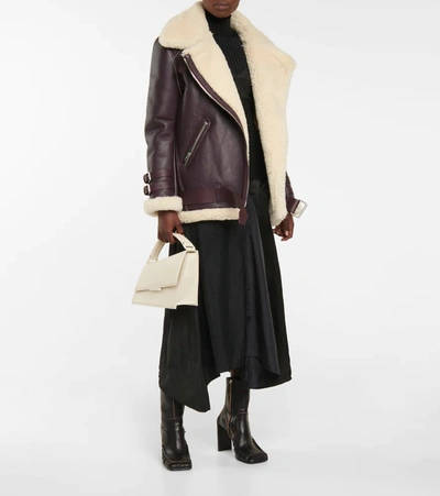 Shop Acne Studios Velocite Leather And Shearling Biker Jacket In Red