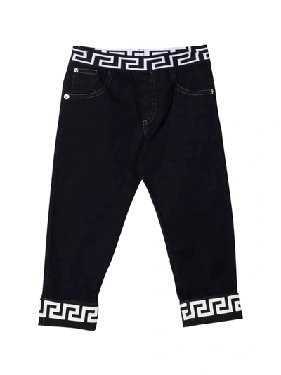 Shop Versace Greca Newborn Jeans Young In Blu/nero/bianco