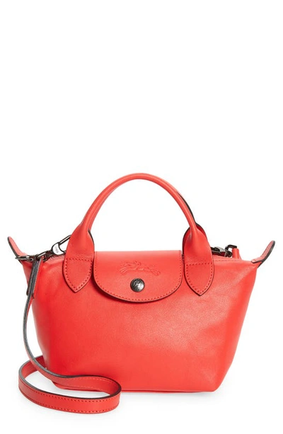 Shop Longchamp Mini Le Pliage Cuir Leather Top Handle Bag In Kiss Red