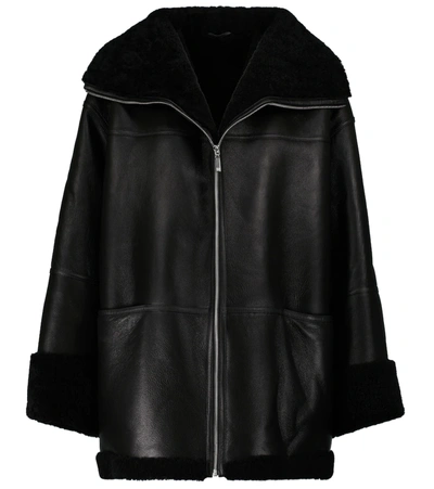 Shop Totême Shearling-lined Leather Jacket In Black