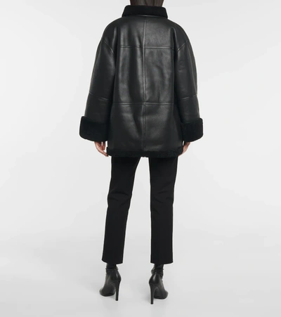 Shop Totême Shearling-lined Leather Jacket In Black