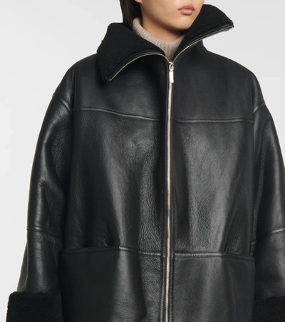 Shop Totême Shearling-lined Leather Jacket In Black