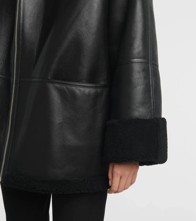 Shop Totême Shearling-lined Leather Jacket In Black