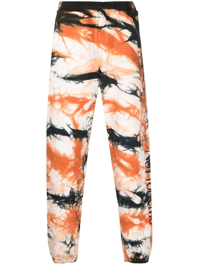 Shop Aries Tie-dye Print Trousers In Orange