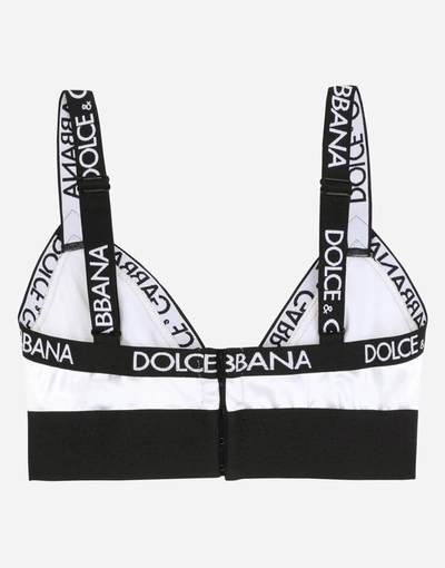 Shop Dolce & Gabbana Satin Triangle Bra With Logo In White