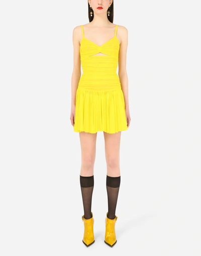 Shop Dolce & Gabbana Draped Tulle Minidress With Peplum In Yellow