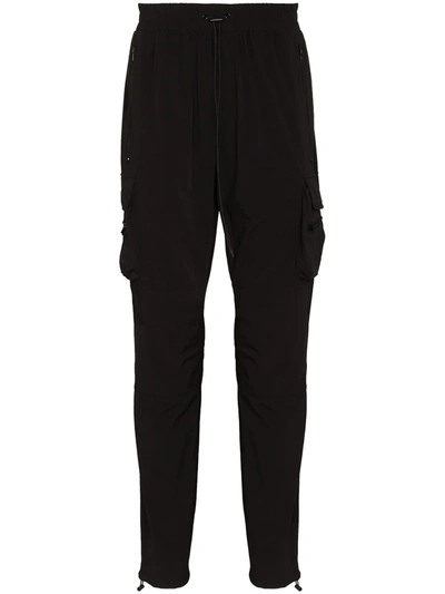 Shop Represent 247 Toggle-fastening Track Pants In 黑色