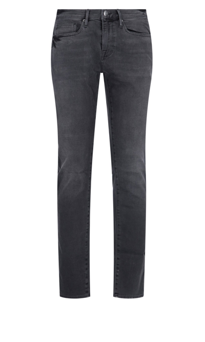 Shop Frame Classic Mid Rise Skinny Jeans In Grey