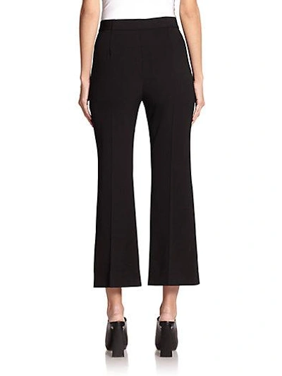 Shop Stella Mccartney Eden Cropped & Flared Wool Trousers In Black