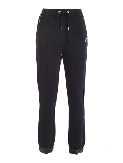 Shop Moncler Nylon Detailed Joggers In Black