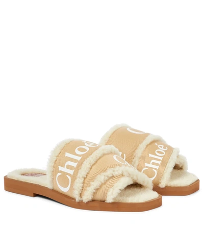 Shop Chloé Woody Shearling-lined Slides In Beige