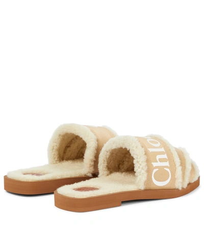 Shop Chloé Woody Shearling-lined Slides In Beige