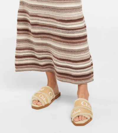 Shop Chloé Woody Shearling-lined Slides In Beige