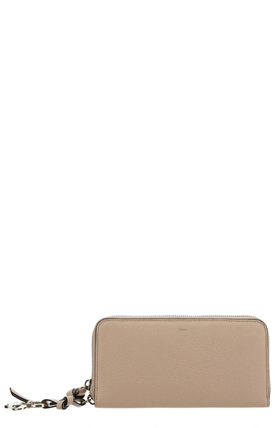 Shop Chloé Logo Detailed Zipped Wallet In Pink