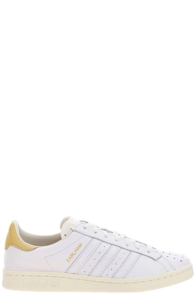 Shop Adidas Originals Earlham Sneakers In White