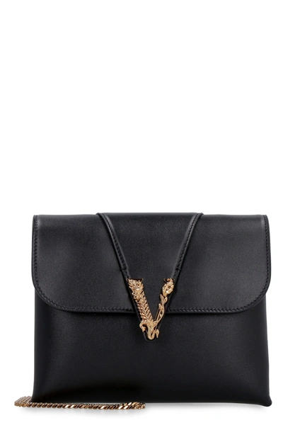 Shop Versace Virtus Leather Clutch With Strap In Black