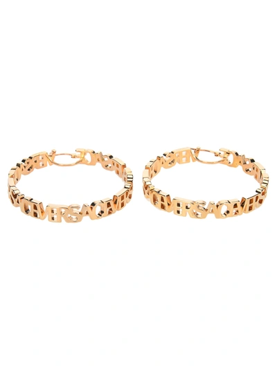 Shop Versace Logo Hoop Earrings In Gold