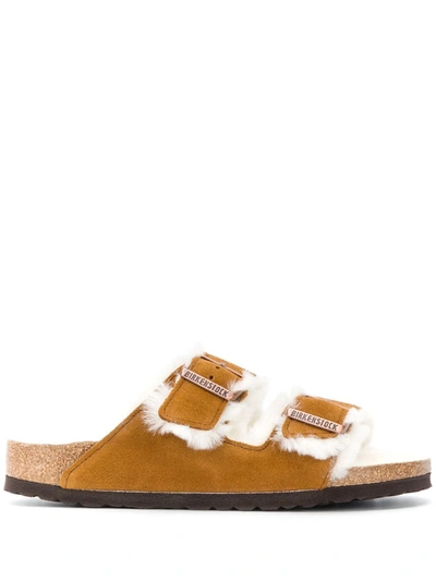 Shop Birkenstock Shearling Sandals In Brown