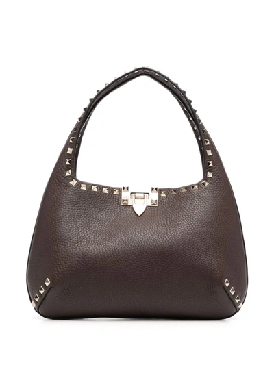 Shop Valentino Rockstud Hobo Shoulder Bag In Brown