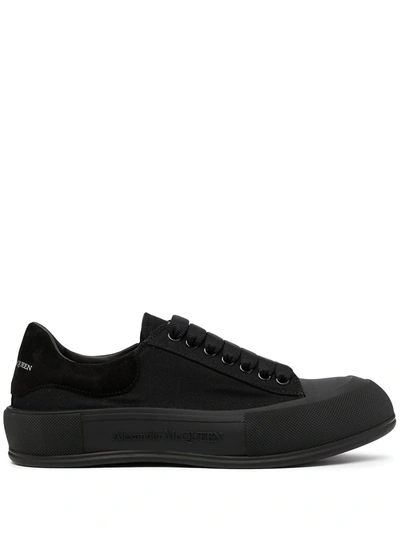 Shop Alexander Mcqueen Deck Low-top Sneakers In 黑色