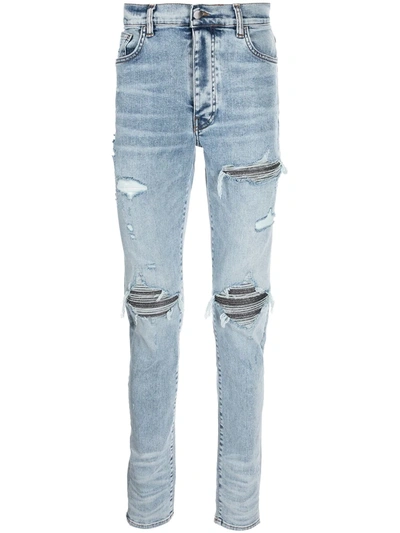 Shop Amiri Ripped-finish Skinny Jeans In 蓝色