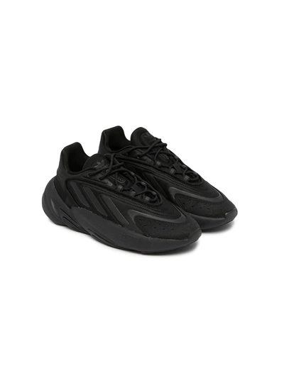 Shop Adidas Originals Ozelia Low-top Sneakers In Black